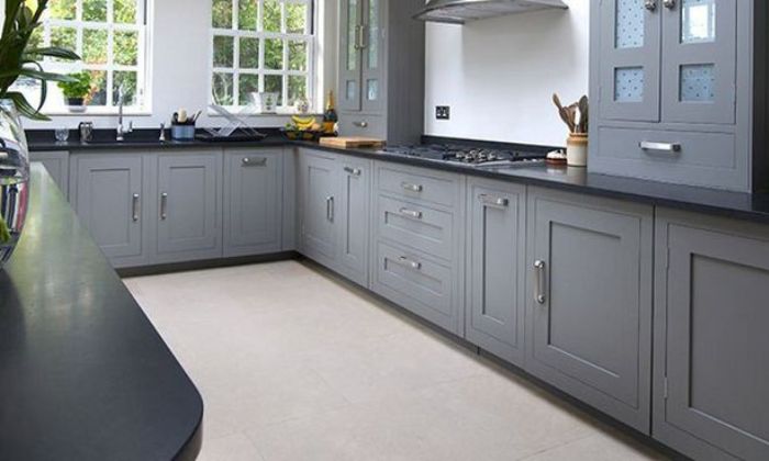 white cabinets with black countertops