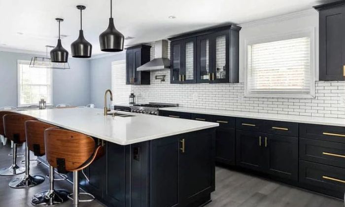 black kitchen cabinets with white countertops