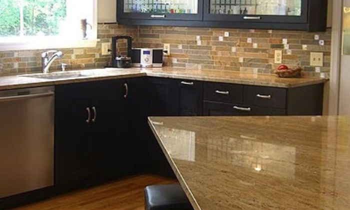 Gold Granite with Black Cabinets