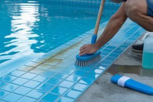 how to clean swimming pool tiles